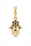 Gold-tone Hamsa hand charm with blue crystals on a white background