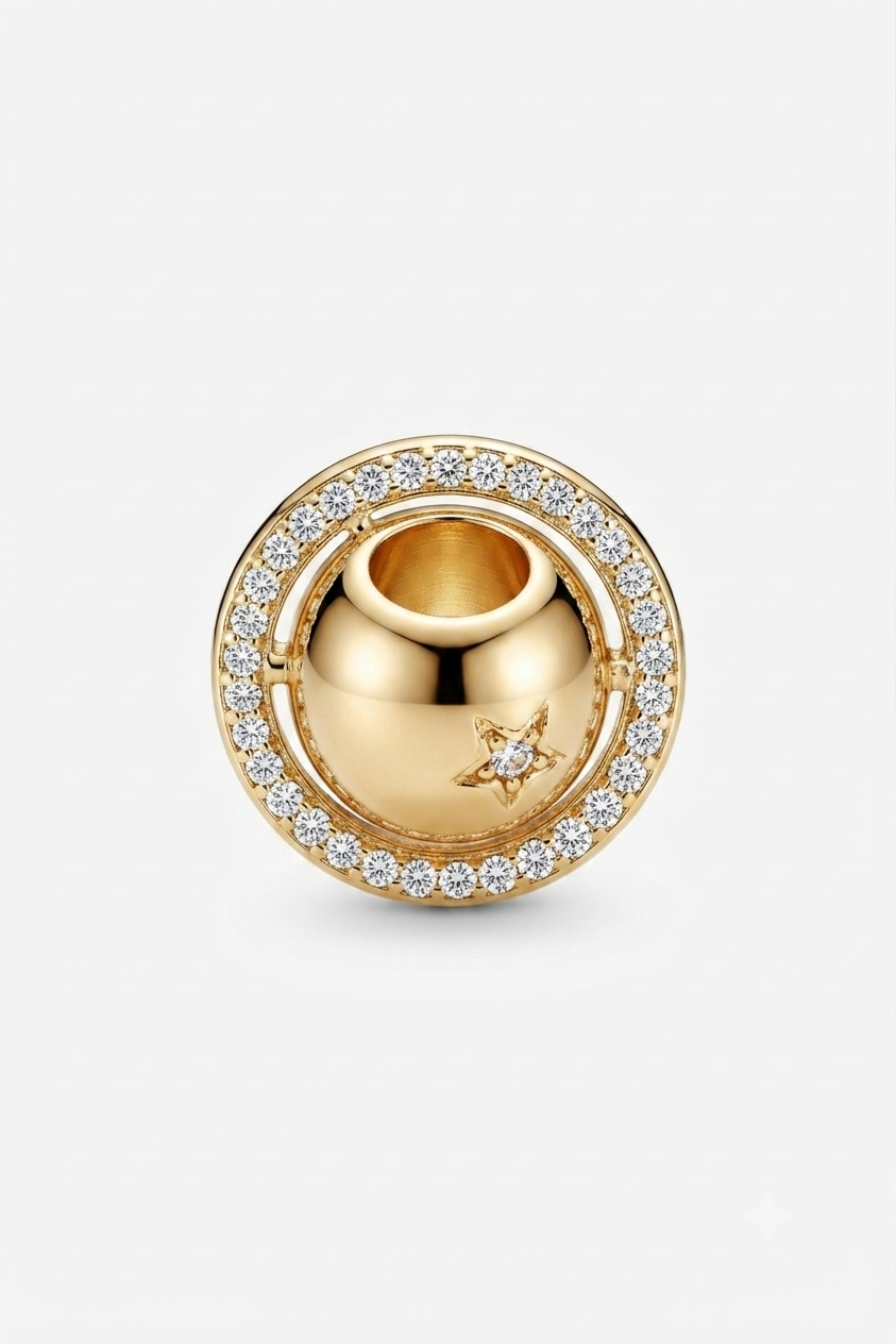 Gold-tone round halo charm with clear crystals and a star detail