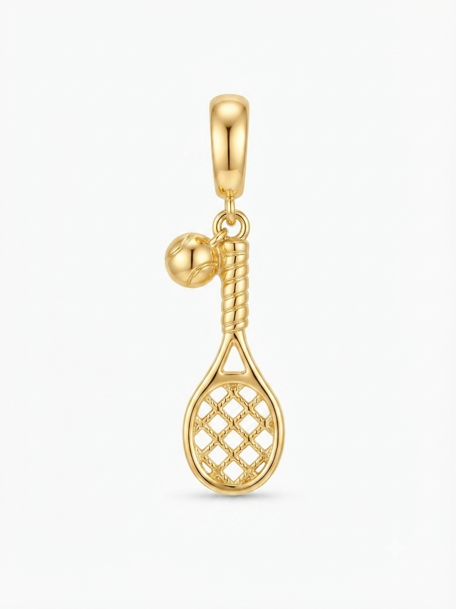 Gold-tone tennis racket and ball dangle charm on a white background