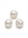 White freshwater pearl beads on a white background